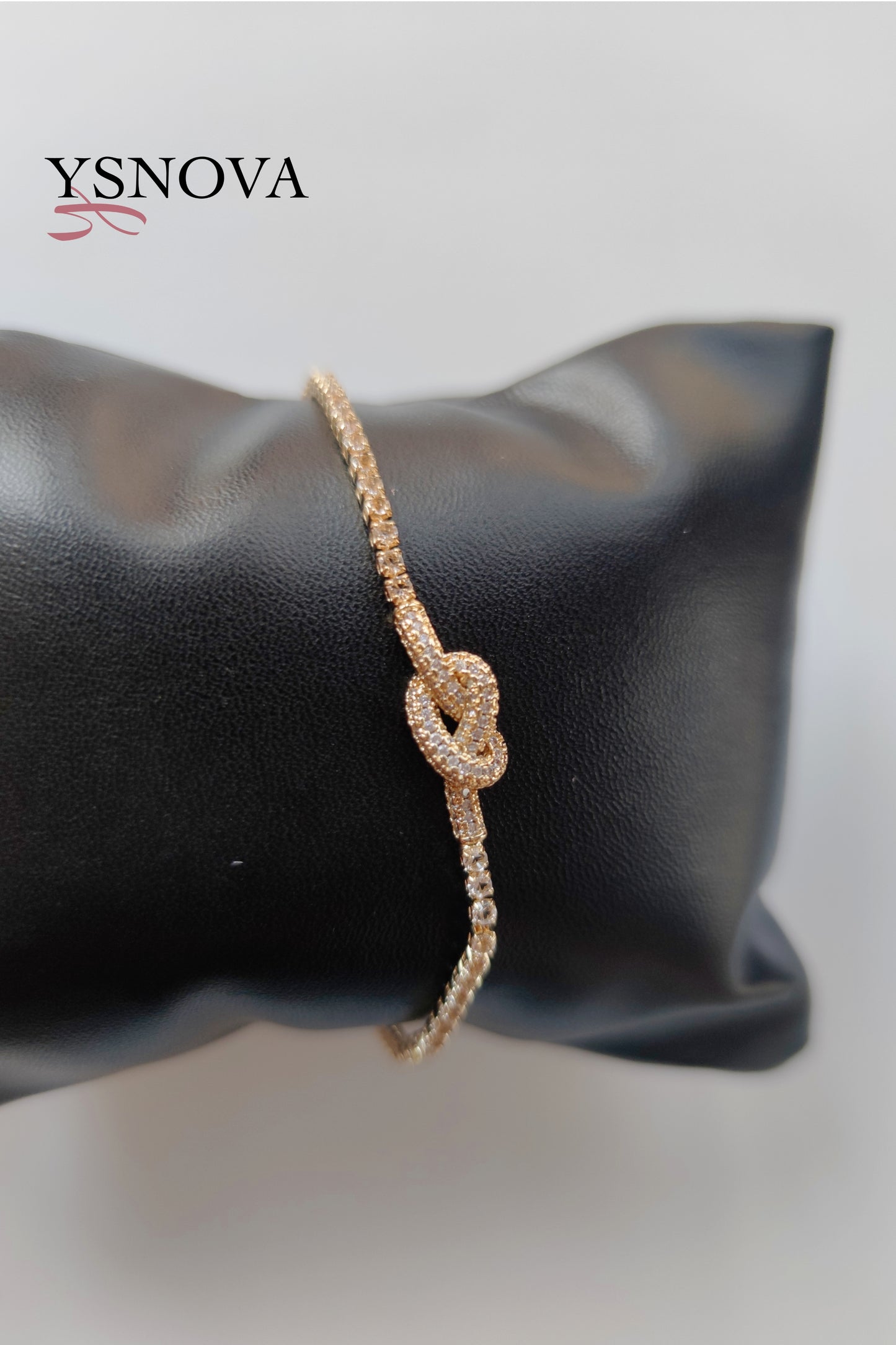 Gold or Silver Plated Stainless Steel Women’s Tennis Bracelet with Zircon Love Knot Design