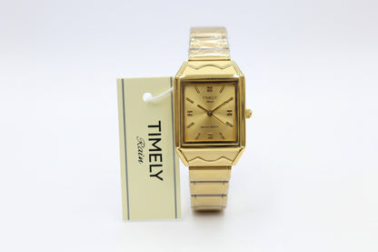 Timely gold watch with gold dail