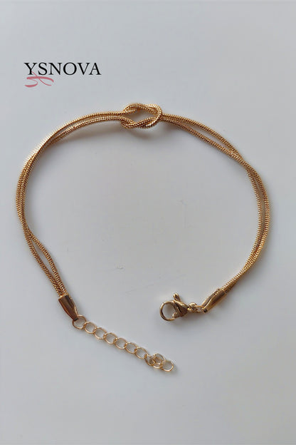 Women’s Bracelet with Double Love Knot Design – Gold or Silver Plated Stainless Steel