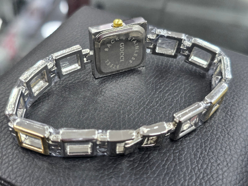 Mix silver X gold open square watch with light gold dail