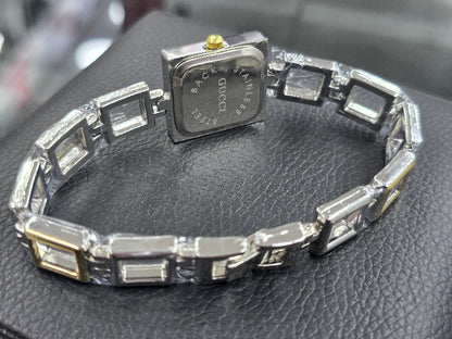 Mix silver X gold open square watch with light gold dail