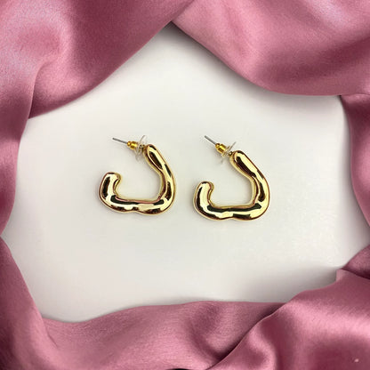 Gold C-chaped hoop earrings