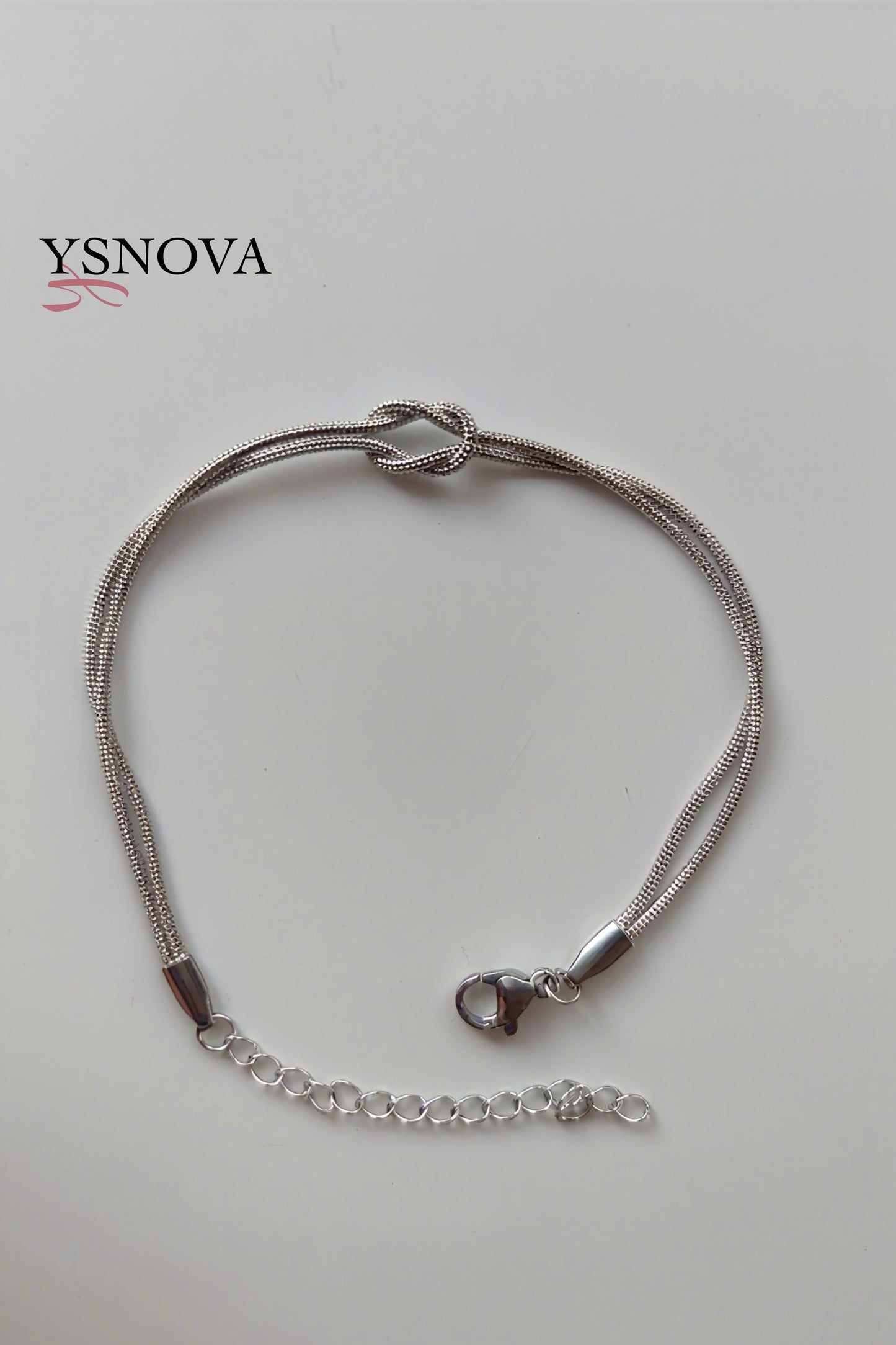 Women’s Bracelet with Double Love Knot Design – Gold or Silver Plated Stainless Steel