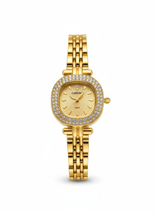 Gold watch with elegant gold dial.