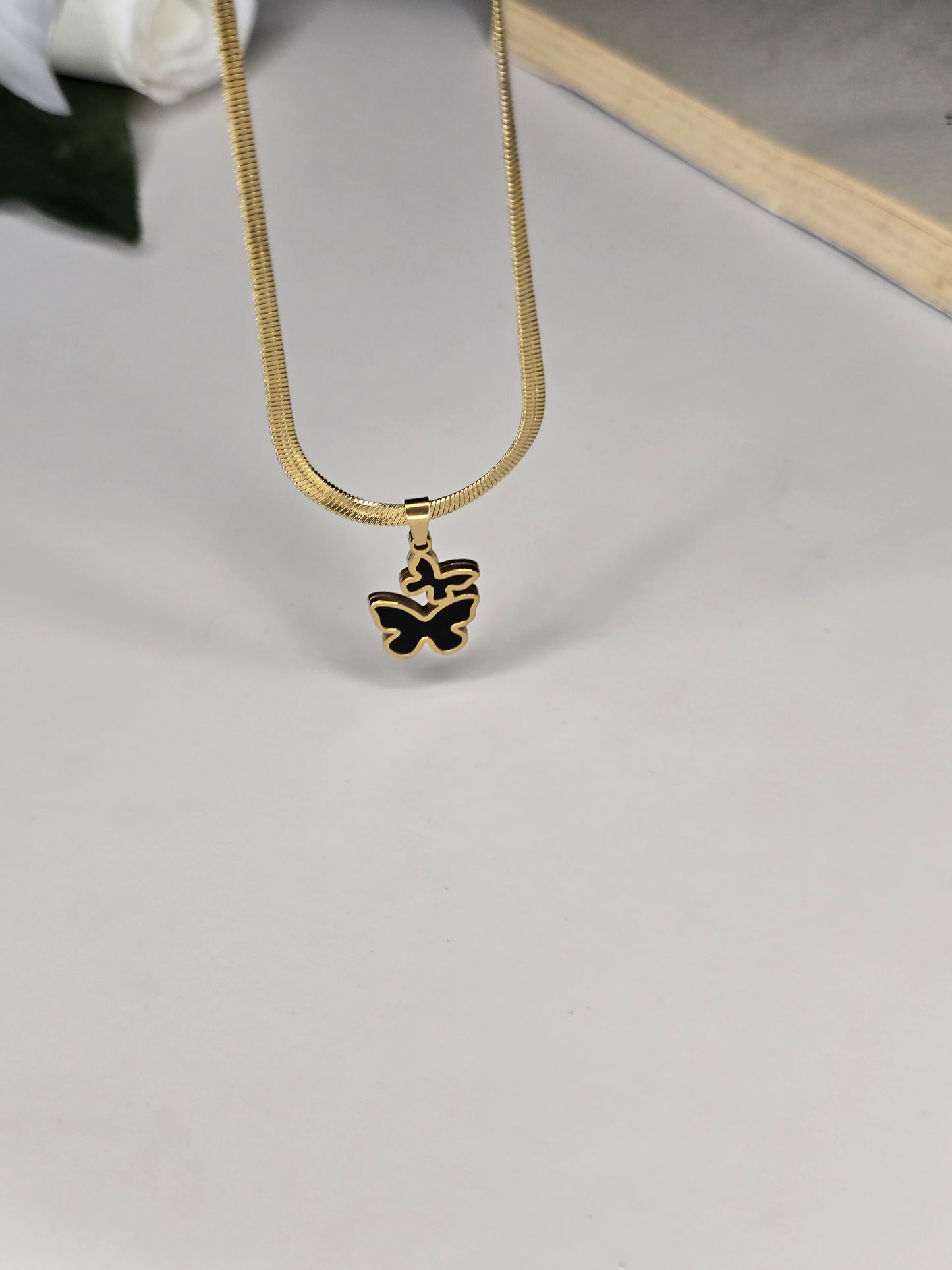 Double Butterfly Pendant Necklace (Black & White) – Gold Plated Stainless Steel