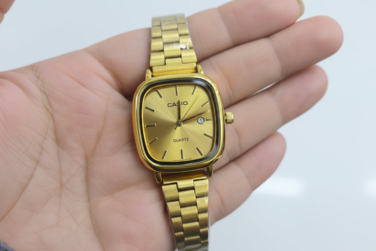 Gold watch with gold Dial Frame .