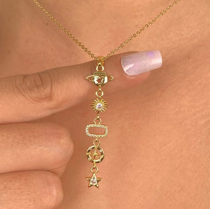 Planet drop necklace featuring multiple charms.