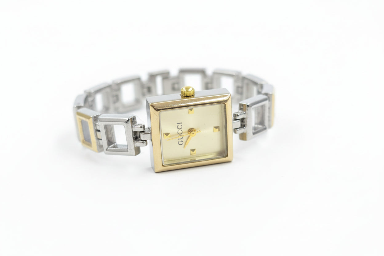 Mix silver X gold open square watch with light gold dail